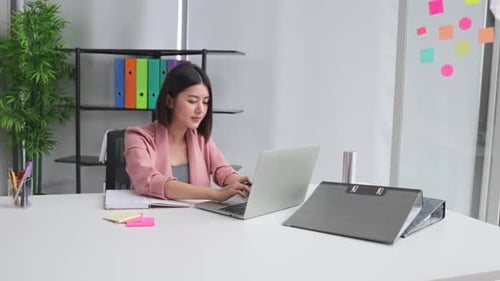 Young Asian business woman in office face portrait smile happy