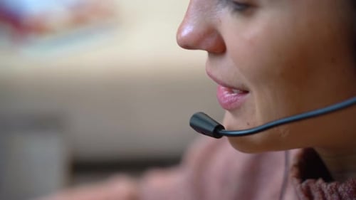 Call center concept. Close-up telesales agent with headset working from home