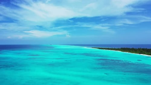 Aerial drone shot sky of paradise seashore beach vacation by shallow sea and white sandy background