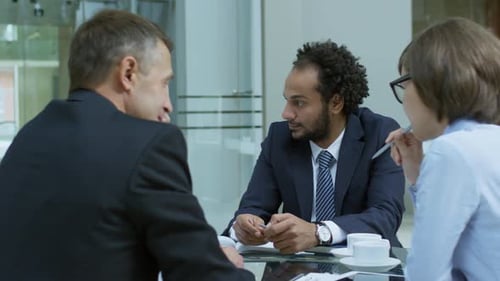 Business Team Meeting at Office Conference Table