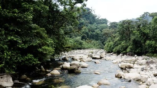 Flying over a mountain river in the Andes of South America