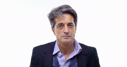 Middle-Aged Man Looking Around Indoors