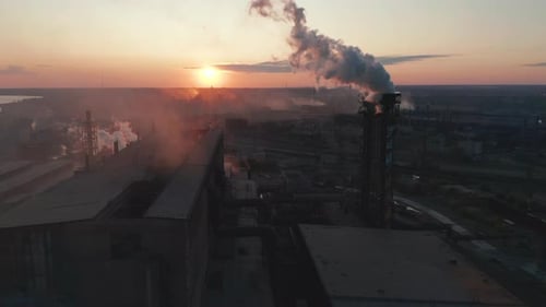 Aerial View. Industry Pipes Pollute the Atmosphere With Smoke.