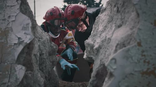 Rescue Workers Searching Through Rubble in Post-Apocalyptic City
