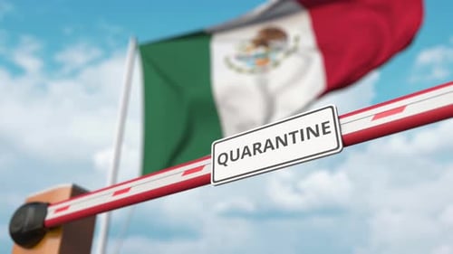 Mexican Flag Waving with Quarantine Barrier Opening