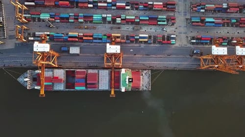 Aerial top view of container cargo ship in the export and import business and logistics