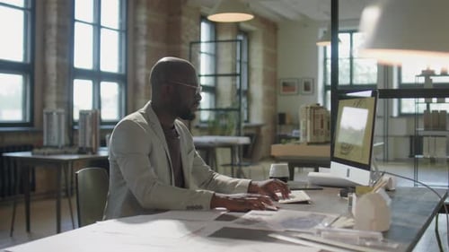 Portrait of Joyous African American Architect at Office Workplace