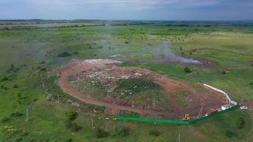 Aerial Top View of A Huge Waste Garbage Dump Rubbish Landfill