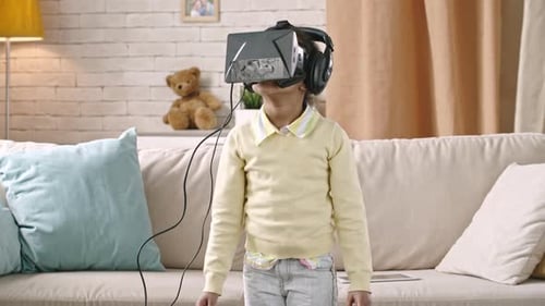 Girl Experiences Virtual Reality with VR Headset