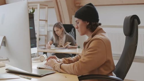 Portrait of Man Developing Software in Office