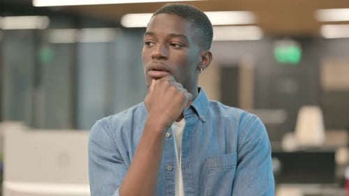 Pensive Young African American Man Thinking