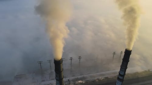 Aerial View of Coal Power Plant High Pipes with Black Smoke Moving Up Polluting Atmosphere at