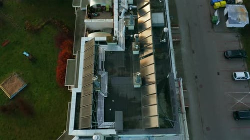 Drone Shot on Modern Multiapartment Buildings with Solar Panels on the Roofs