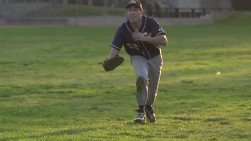 Baseball Player Running To Catch A Baseball