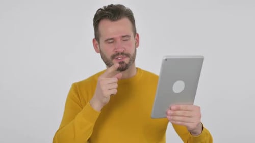 Portrait of Video Call on Tablet By Middle Aged Man in Office
