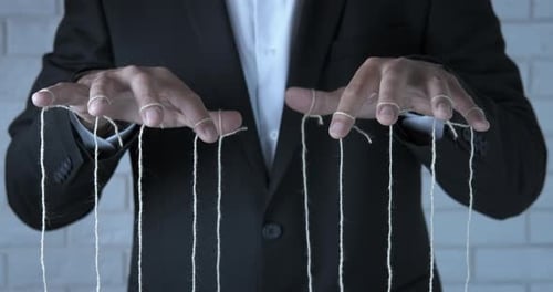 Hands Manipulating Strings as if Controlling a Puppet