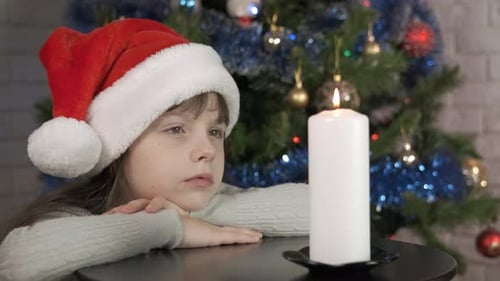 Child Atmospheric Christmas with Candle