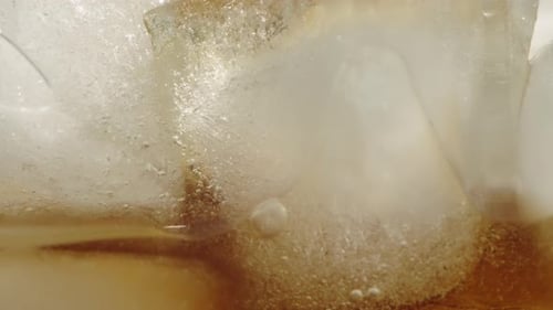 Pouring Of Cola Drink Close Up