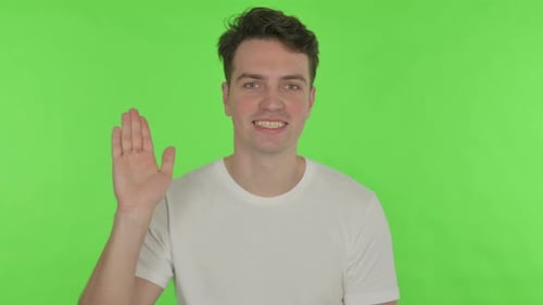 Video Chat By Young Man on Green Background