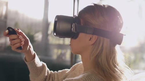 Woman Using Virtual Reality Headset in Bright Home