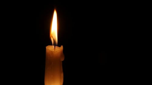 Burning Wax Candle. Close Up