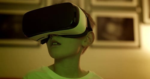 Boy Experiencing Virtual Reality with VR Headset