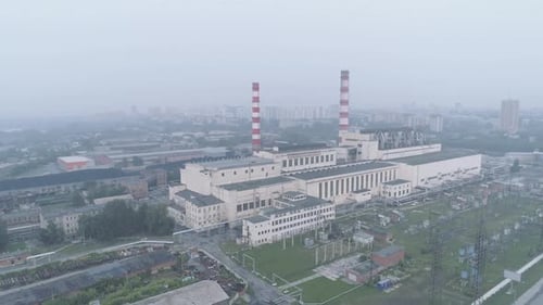 Smoke Over an Industrial Building or Plant Due To Forest Fires. Air Pollution and Environmental