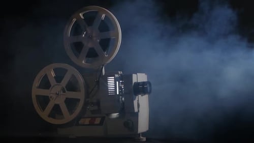 Vintage Film Projector in Dark Smoky Room