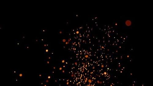 Fiery Sparks and Embers Rising on Black Background