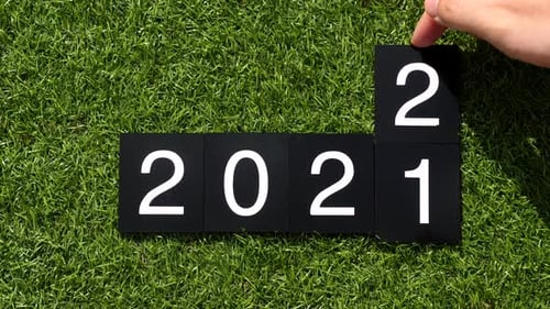 Changing Tiles on Grass Shows New Year 2022