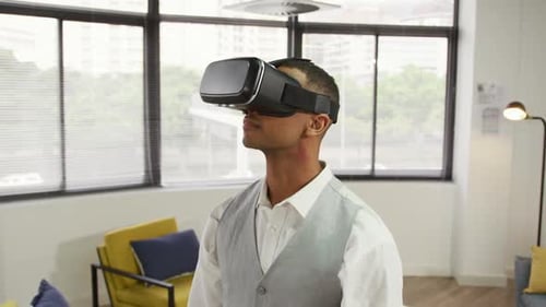 Young Adult Exploring Virtual Reality in Modern Office