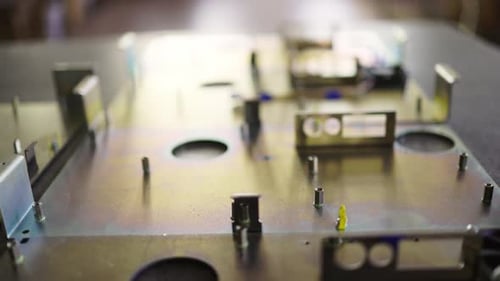 Slider Shot of a Blank Metal Components in Workshop Laboratory