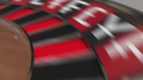 Ball in Euro Sign Pocket on Casino Roulette Wheel