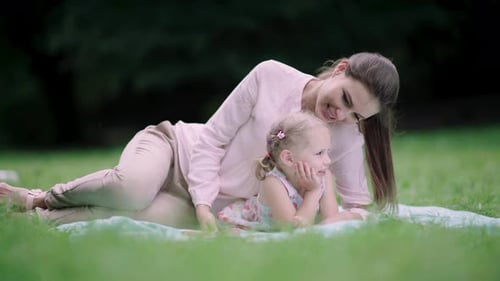 Family In Nature. Mother And Daughter Having Fun At Park