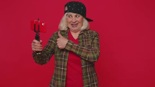 Woman Blogger Take Selfie on Mobile Phone Selfie Stick Communicate Video Call Online with Subscriber