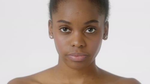 Close Up Portrait of Woman with Dark Textured Hair