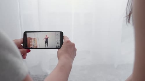 Watching Fitness Class on Phone