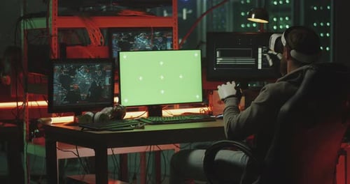 Young Adult Working in a Futuristic Server Room