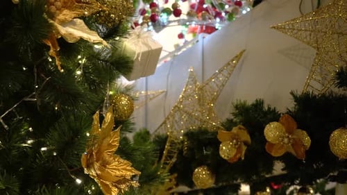 Festive Christmas Tree Decorations with Gold Ornaments