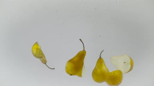 Pears dropped into water, Ultra Slow Motion