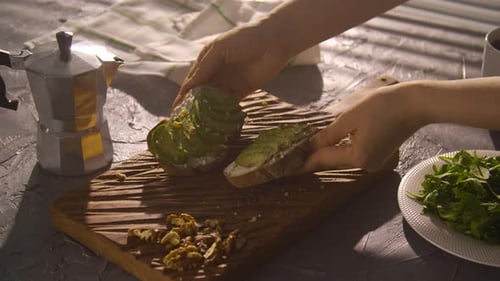 Avocado Toast, Coffee, and Greens on Wooden Board