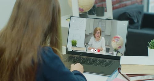 Child Studies with Tutor During Online Lesson