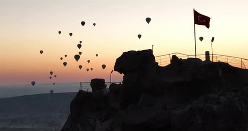 Aerial Cinematic Drone View of Colorful Hot Air Balloon Flying Over Cappadocia