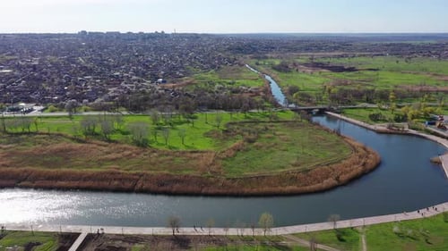 A bird's eye view of the river. The river flows in the city