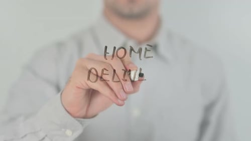 Writing Home Delivery On Glass Surface Close Up