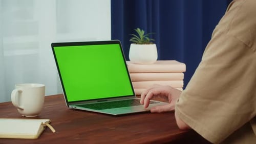 Man Student Using Laptop with Chroma Key Closeup