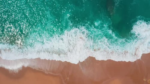 Flight over Sandy Beach and Waves