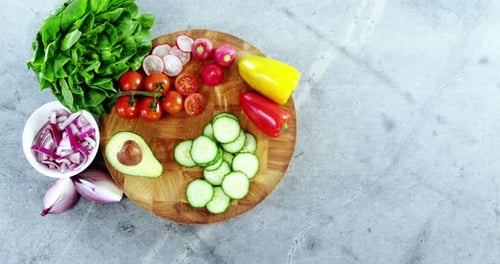 Fresh Salad Ingredients on Cutting Board from Above