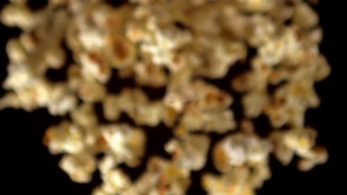 Super Slow Motion Popcorn on a Black Background