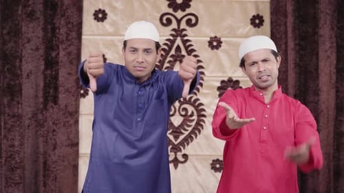 Young Adults Disapprove with Thumbs Down Gesture